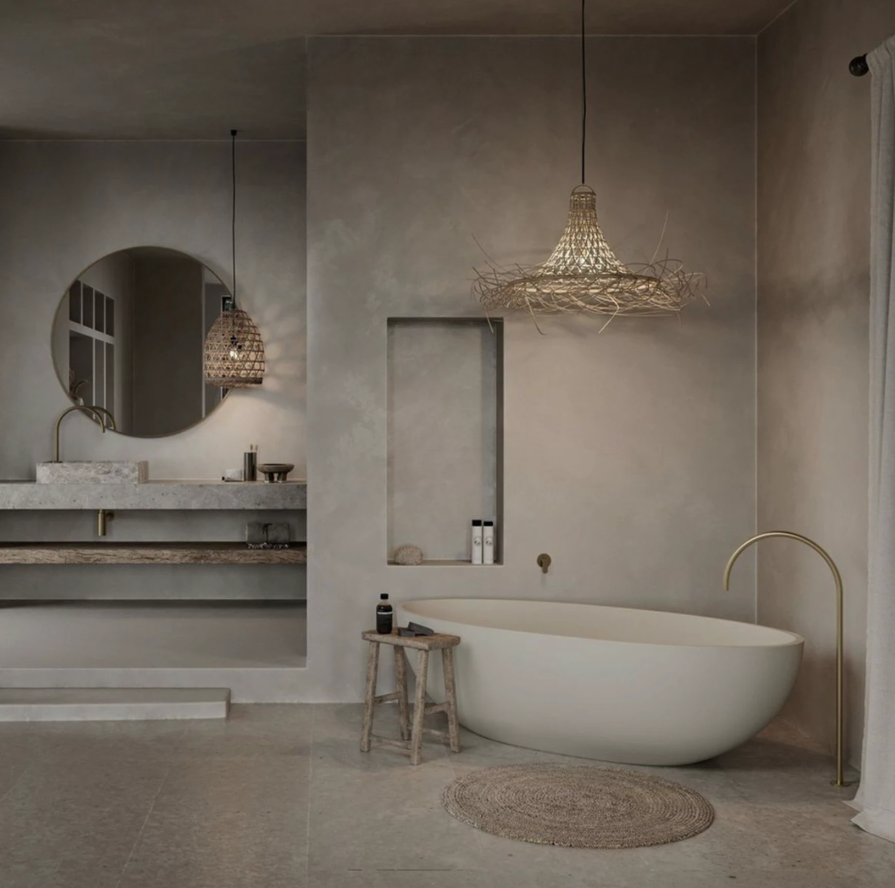 Boho woven ceiling lamp with warm light in a neutral bathroom.