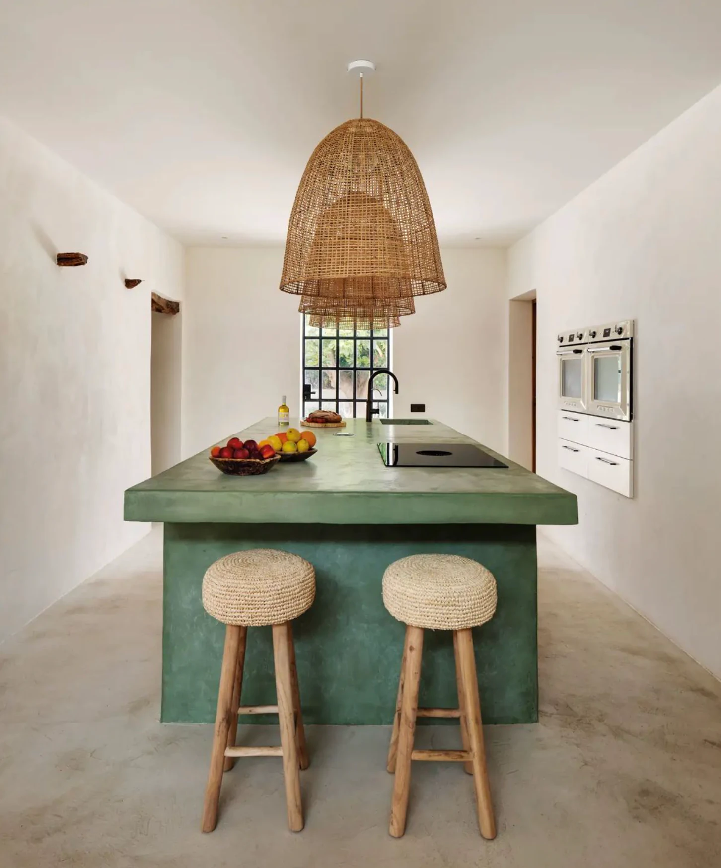 Kitchen with PītasLampas ceiling lamp. Handmade reed woven, warm lighting.